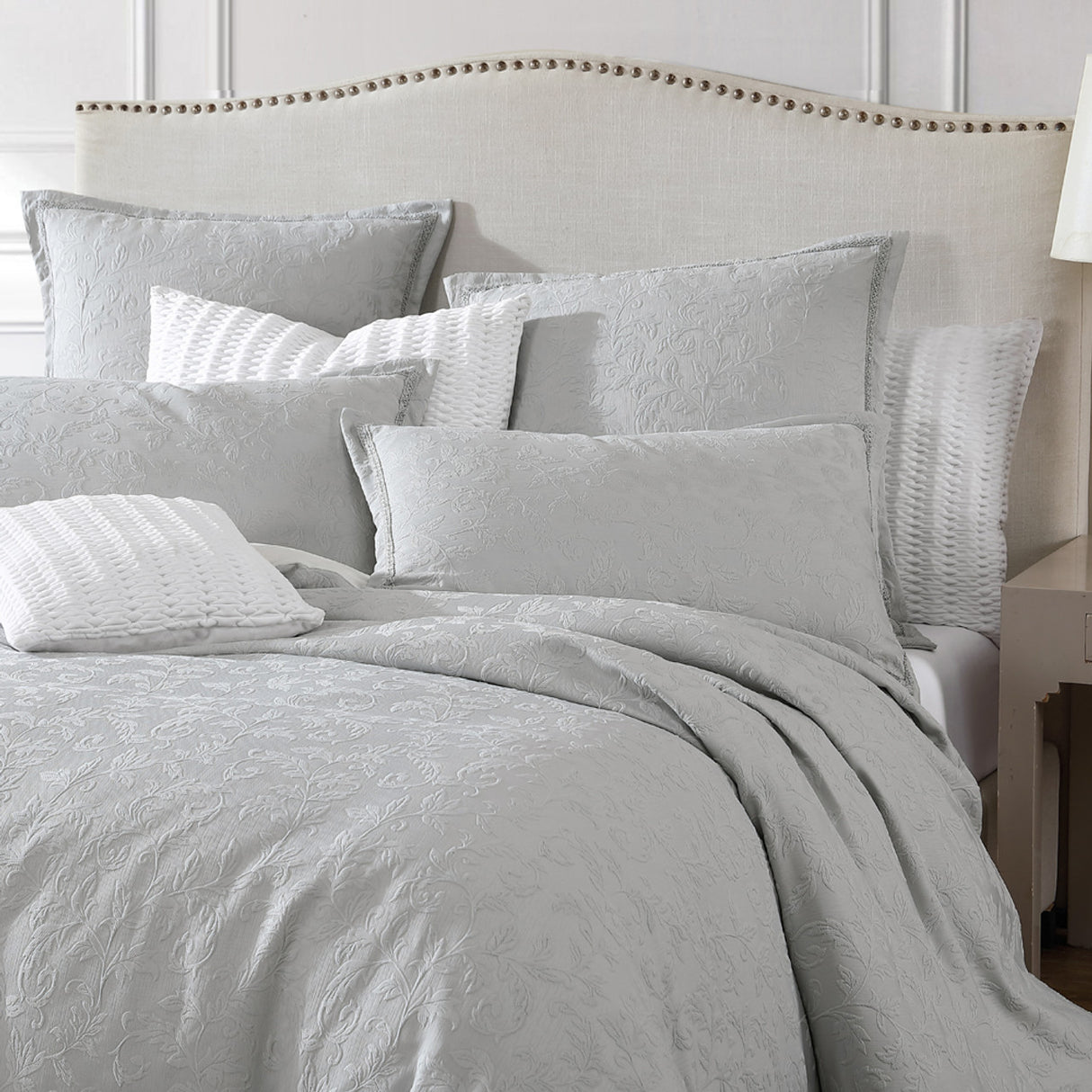 Queen Duvet Cover Set in Valentina Cloud features delicate floral designs on textured fabric with a sophisticated silver braid.