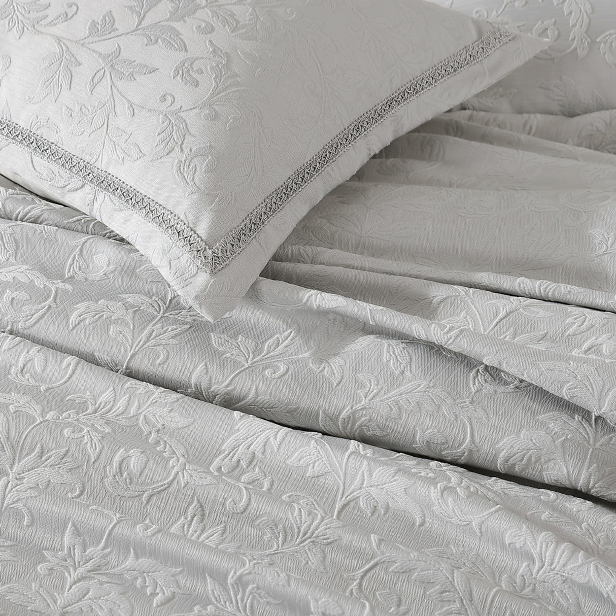 Queen Duvet Cover Set featuring delicate floral designs and silver braid, ideal for enhancing bedroom elegance and comfort.