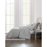 King Duvet Cover Set featuring floral clusters, textured ground, and elegant silver braid for a serene bedroom ambiance.