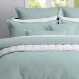 Single duvet cover set featuring a textured waffle weave design for a stylish and serene bedroom atmosphere.