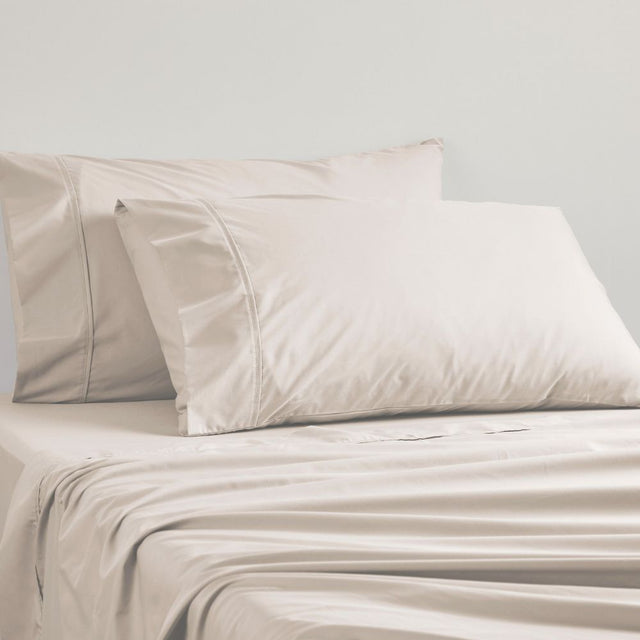 Logan and Mason Linen Sheet Set in 250TC Poly/Cotton Percale, double size, featuring cuffing and piping for elegance.