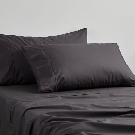 Logan and Mason King sheet set in Asphalt, featuring 250TC poly/cotton percale for comfort, durability, and style.