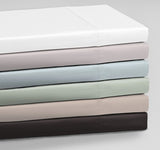 King-sized Logan and Mason sheet set in linen color, crafted from 250TC poly/cotton percale for comfort and durability.