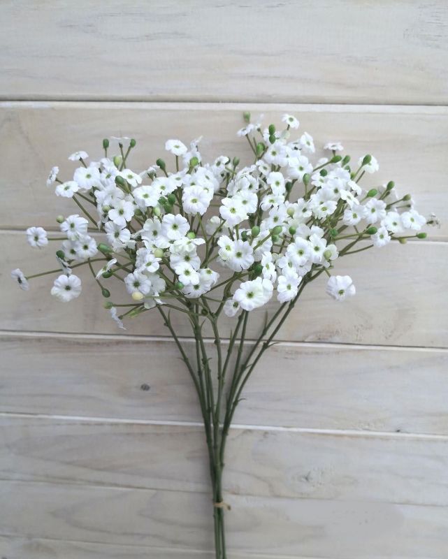 Nine lifelike artificial baby breath sprays in white, perfect for home decor and event styling, offering long-lasting elegance.