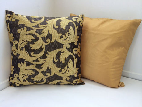Set of 2 elegant gold vine design cushion covers, 42cm, premium poly-cotton fabric with zip closure for easy cleaning.