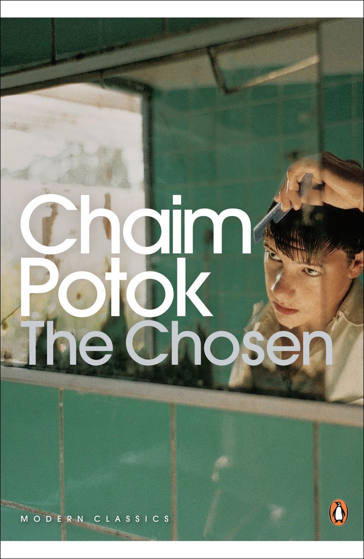 Paperback novel "The Chosen" by Penguin UK exploring friendship and faith between two Jewish boys from different backgrounds.