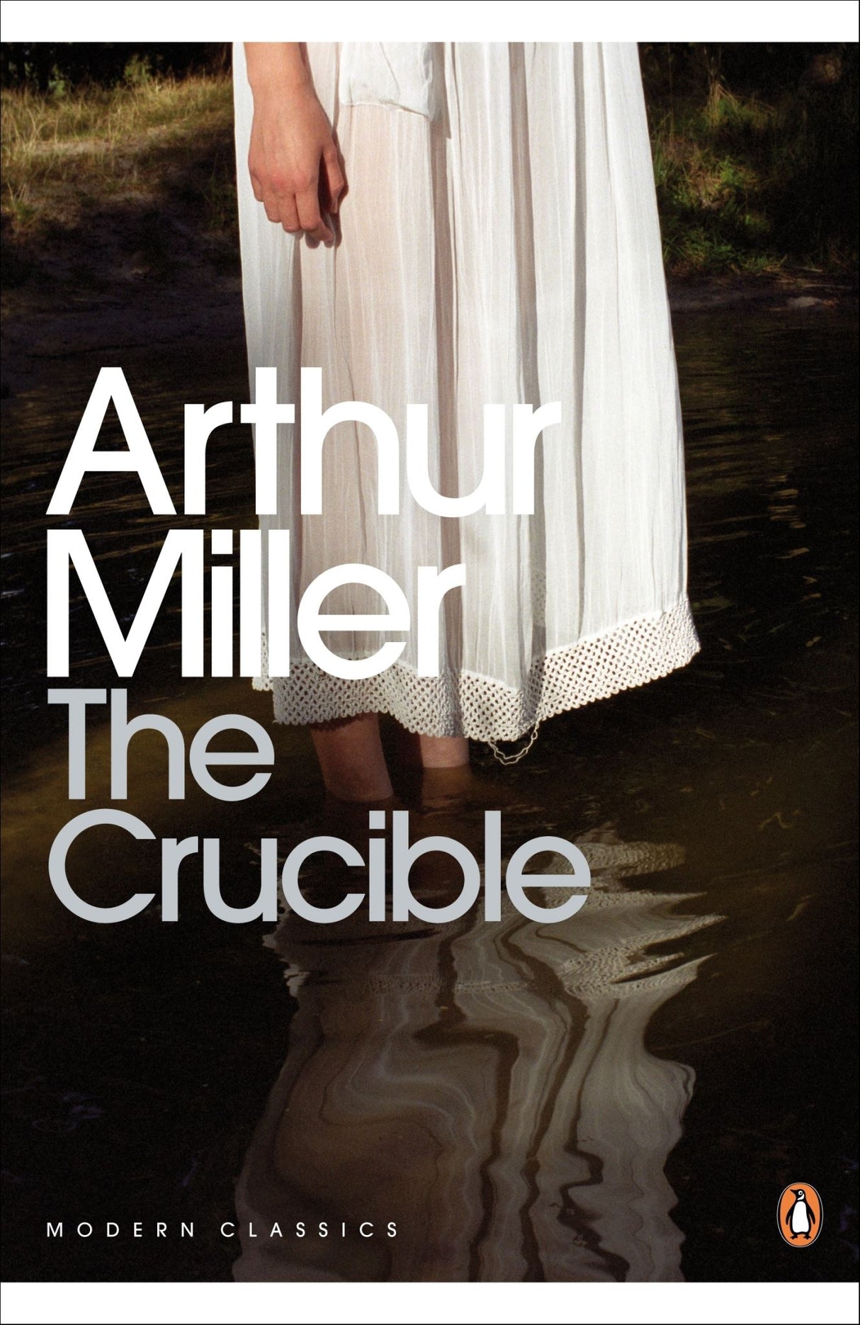A B-format paperback of Arthur Miller's 'The Crucible,' exploring mass hysteria and the Salem witch trials.