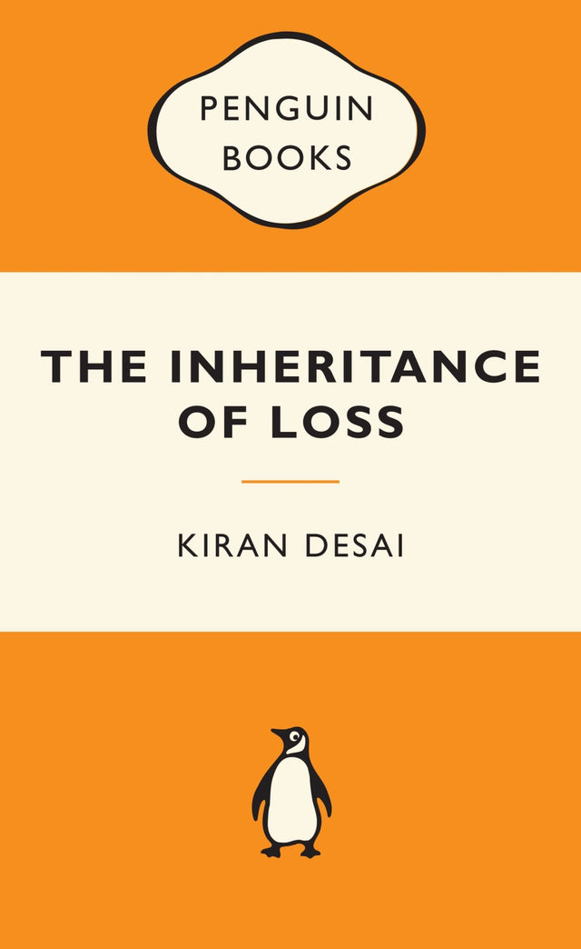 Cover of "The Inheritance of Loss: Popular Penguins," showcasing the Himalayas and illustrating themes of exile and identity.