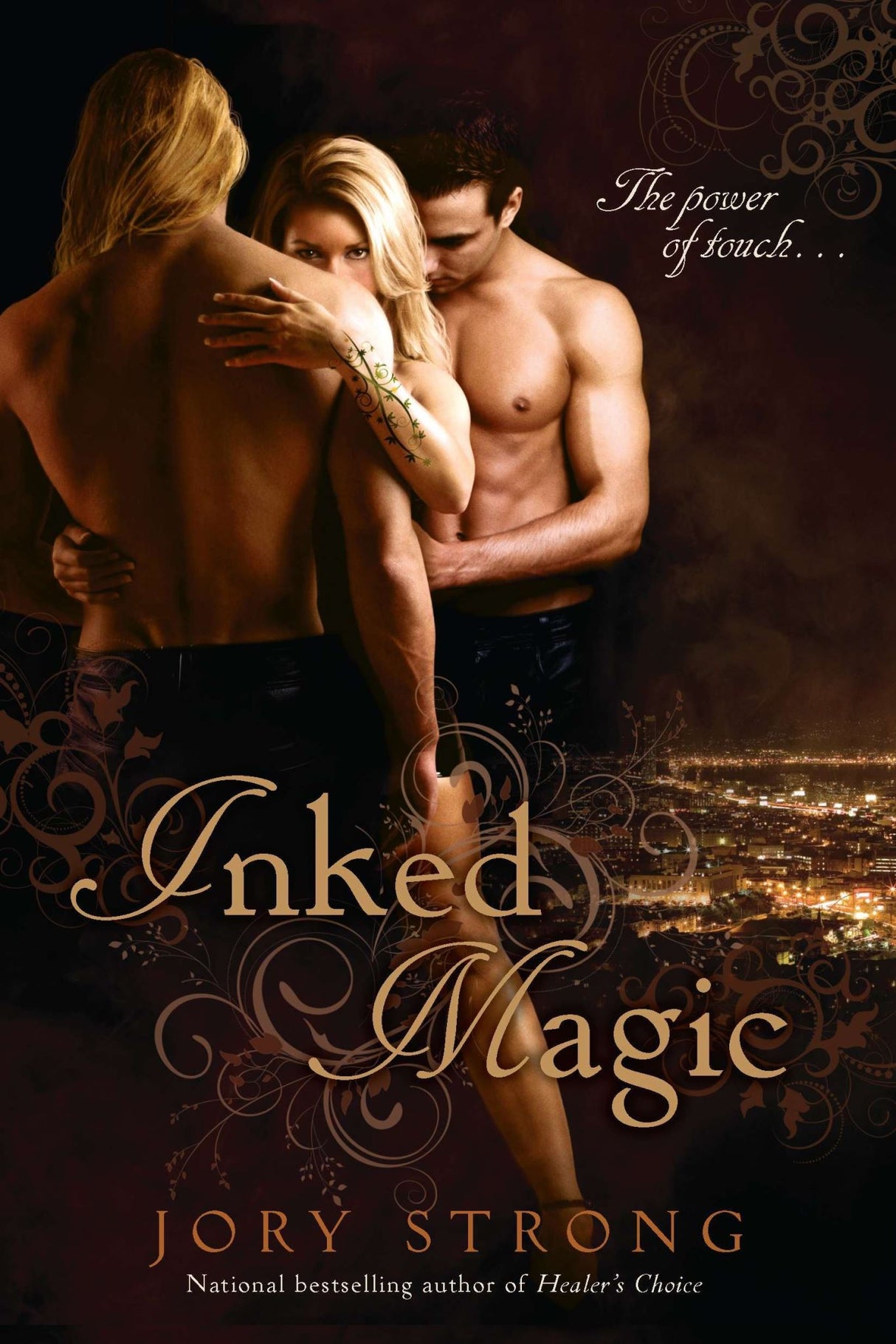 Cover of "Inked Magic," a fantasy romance novel featuring a tattoo artist with supernatural abilities amidst crime and intrigue.