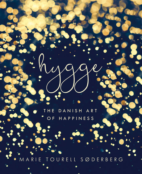 Beautiful guide to hygge by Marie Tourell Søderberg, featuring cozy home ideas, cooking, and decorating tips.