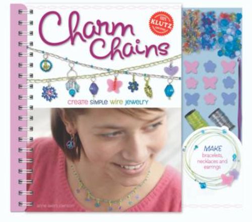 Colorful charm-making kit featuring six spiral-bound project guides for crafting bracelets, necklaces, and earrings.