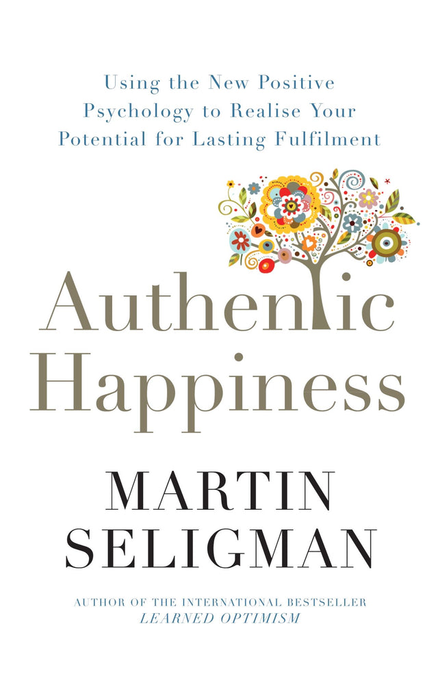 Book cover of "Authentic Happiness" by Martin E. Seligman, focusing on cultivating joy and personal growth through positive psychology.