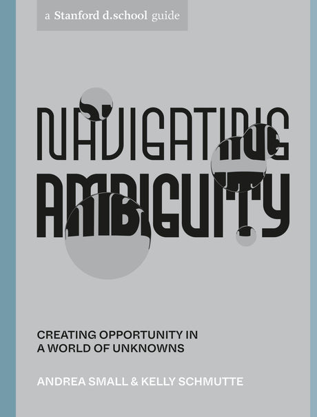 Cover of "Navigating Ambiguity," featuring cut-paper artwork, a guide to embracing uncertainty in the creative process.