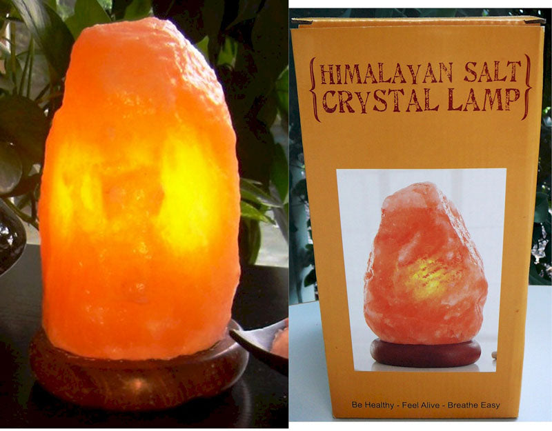 Himalayan salt lamp with brown wood base, 1.5-2kg, 17cm tall; purifies air and enhances decor with a warm glow.