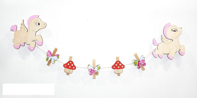 Pine wall art pegs for displaying children's artwork, crafts, and photos, creating a personalized gallery space.