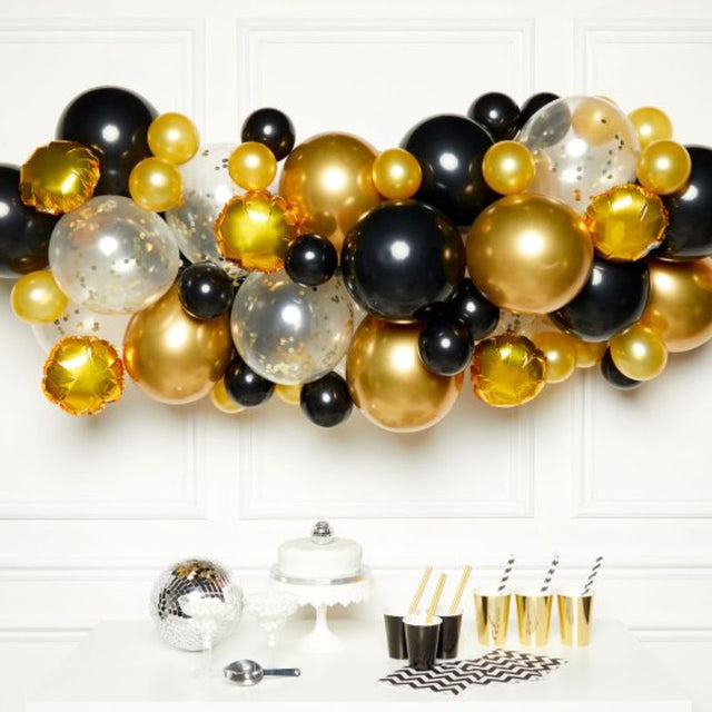 Balloon garland kit in black, gold, and silver with 66 balloons, perfect for elegant events and DIY party decorations.