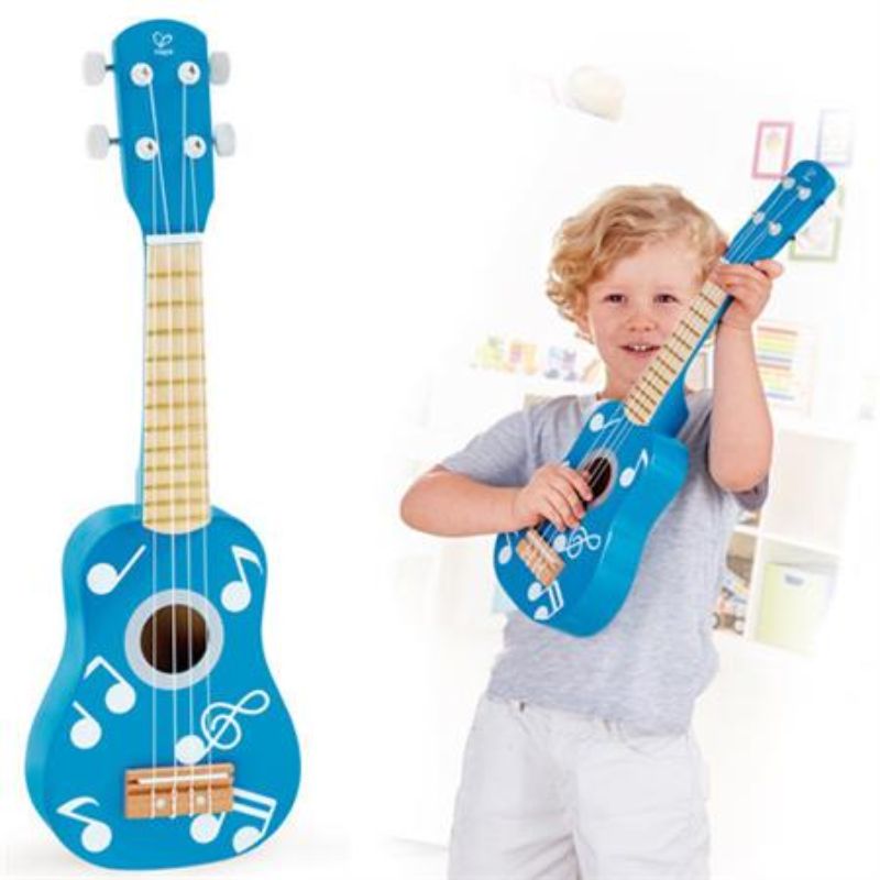 Hape Ukulele in vibrant blue, featuring four tune-able strings, perfect for children to explore music and creativity.