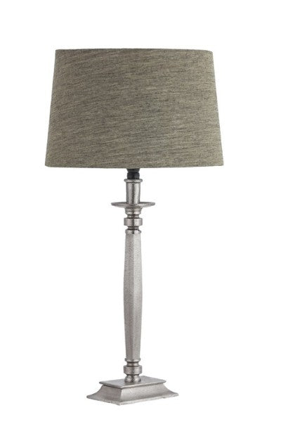 Table lamp with bronze base and south linen shade, perfect for soft illumination and elegant home decor.