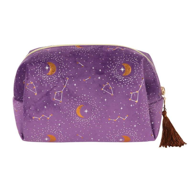 Purple velvet makeup bag with gold crescent moon details and tassel, perfect for astrology lovers and beauty essentials.