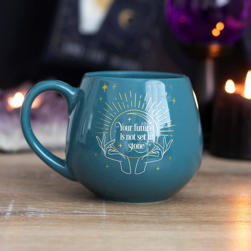 Color-changing green mug reveals hidden fortune with mystical design when filled, perfect for unique drinkware collection.