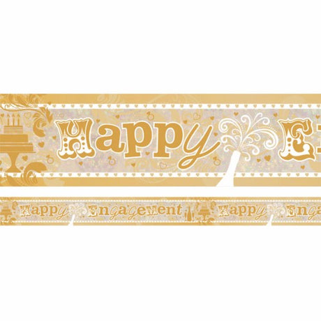 Holographic engagement banner, 2.7m x 13cm, reflecting light with a festive design for memorable celebrations.