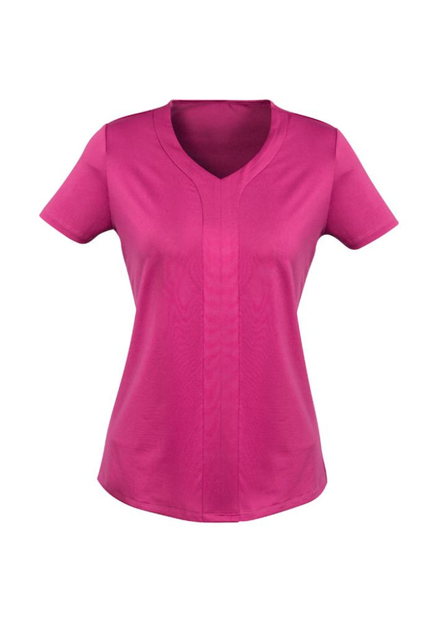 Advatex Mae Short Sleeve Knit Top in Melon, featuring a curved 'V' neck, stylish tab, and antimicrobial stretch fabric for comfort.