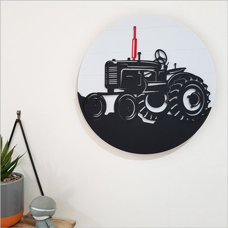Vintage tractor wall art in vibrant colors; perfect for nursery or rustic-themed decor, measuring 30cm in diameter.