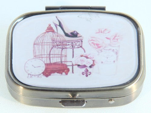 Elegant French Theme Pill Box in a stylish compact design, perfect for organizing medications and vitamins, packaged in a black gift box.