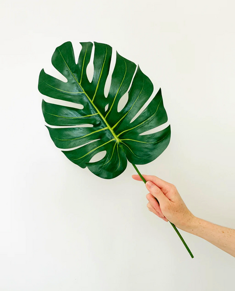 Lifelike 85cm artificial monstera leaf, perfect for adding tropical elegance to home decor without maintenance.