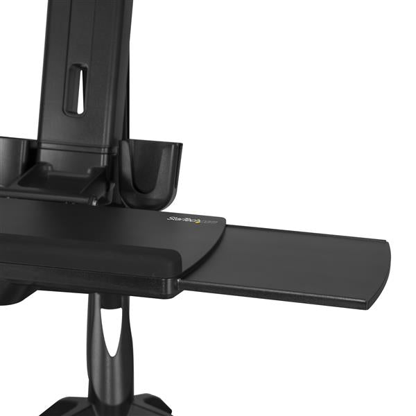 Sit Stand Dual Monitor Arm showcasing ergonomic features, height adjustment, and spacious keyboard tray for a productive workspace.