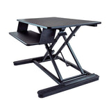 Sit-stand desk converter with a large 900 mm surface, adjustable height, supports dual monitors, promotes ergonomic comfort.