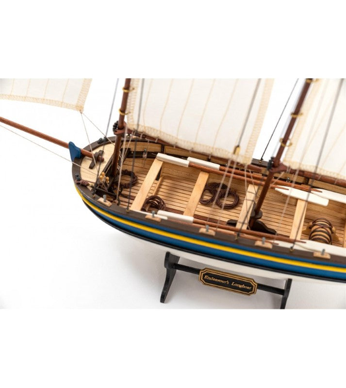 Detailed wooden model kit of the Longboat Endeavour, featuring high-quality materials and components for ship modeling enthusiasts.
