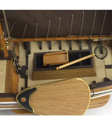 Detailed 1/35 scale model of a Dutch fishing boat, featuring laser-cut parts and hand-sewn cotton sails.