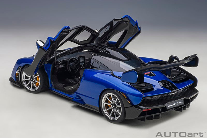 Diecast model of a blue McLaren Senna, showcasing intricate details and realistic features for collectors and enthusiasts.