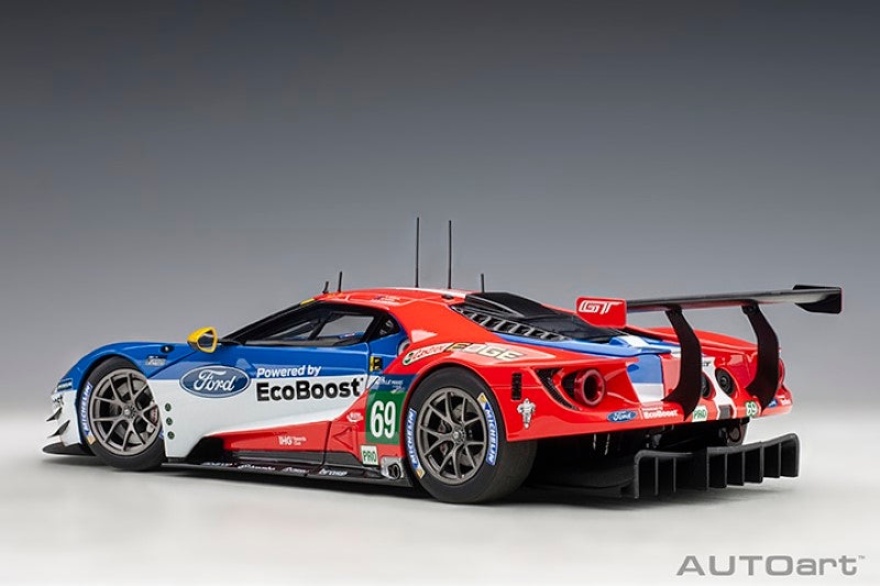 Diecast model of the 2016 Ford GT #69 driven by Scott Dixon, showcasing intricate details and a sleek finish.