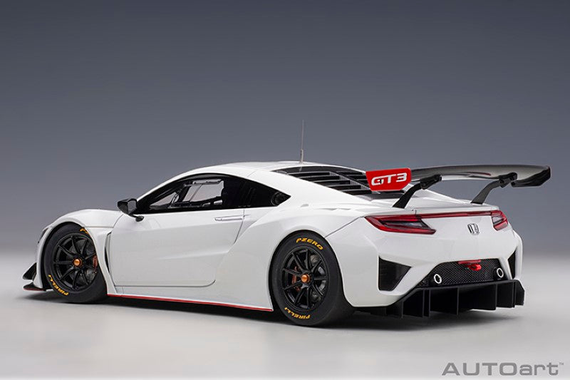 Diecast model of a 2018 Honda NSX GT3 in white, showcasing detailed aerodynamic design for collectors and enthusiasts.