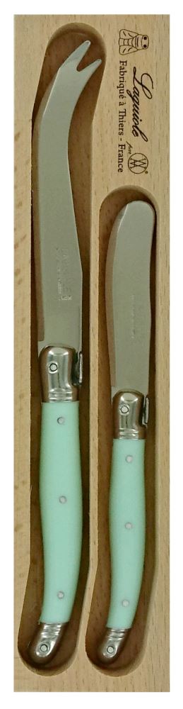 Pale green cheese knife and spreader set by Andre Verdier, featuring stainless steel blades and ergonomic resin handles.