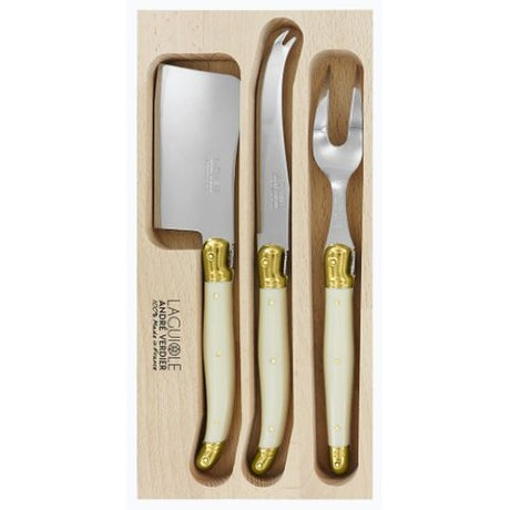 Elegant 3-piece cheese knife set in ivory and brass, perfect for serving various cheese types with style.