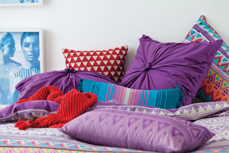 Vibrant Akeem Purple European pillowcase featuring Navajo-inspired design, crafted from 250 thread count cotton percale.