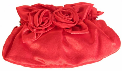 Elegant red handbag with gathered rose accents, perfect for adding style and functionality to any outfit.