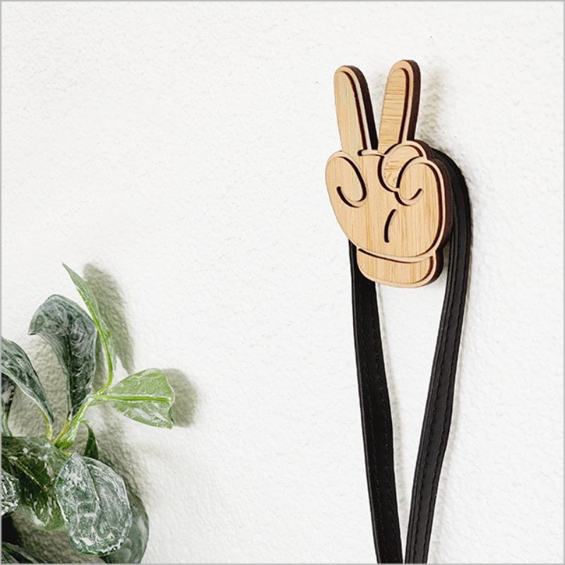 Bamboo Hook in peace hand design, 6.5cm, ideal for hanging baby clothes and towels with eco-friendly style.