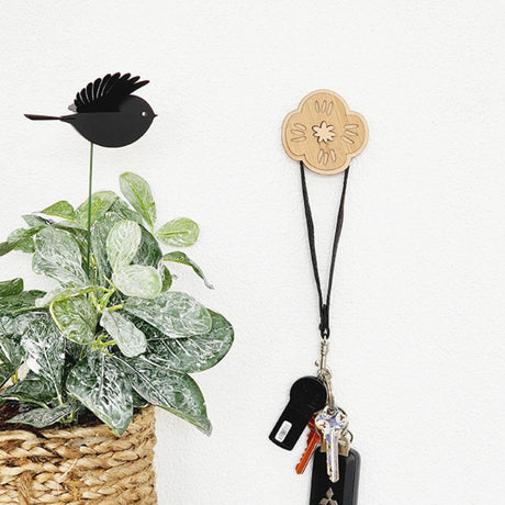 Eco-friendly bamboo wall hook, 6.5cm, designed for stylish organization of clothes and bags. Sleek and sturdy design.