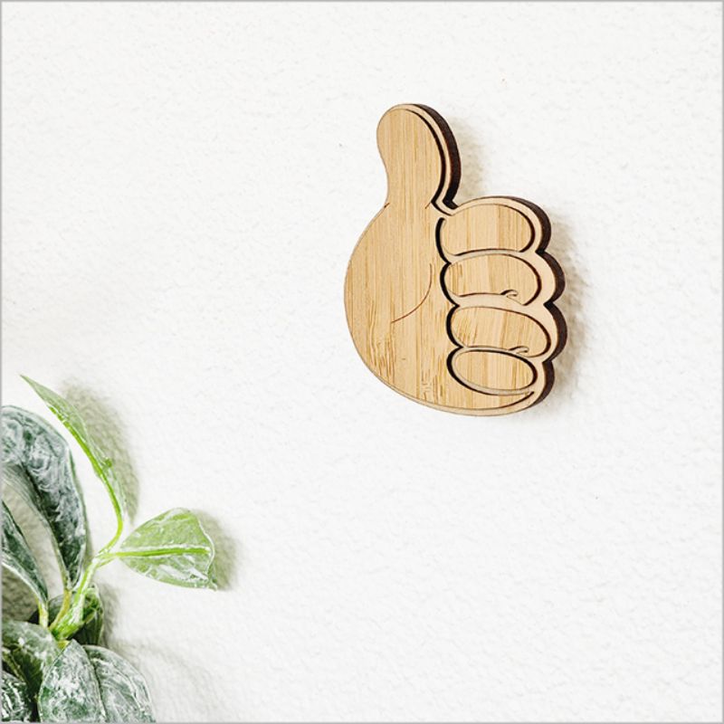 Elegant 6.5cm laser-cut bamboo wall hook for organizing clothes, towels, and bags, sustainably crafted and gift-ready.