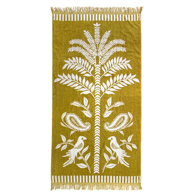 Playa Beach Towel: Luxurious oversized cotton towel with velour finish and fringing, perfect for beach or pool lounging.