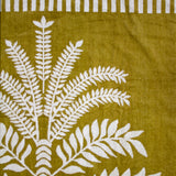 Luxurious oversized Playa Beach Towel, soft cotton with velour finish and natural fringing, perfect for beach and pool lounging.