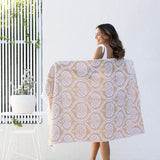 Luxurious Tamarindo Beach Towel in Egyptian cotton, oversized 86 x 160cm, soft velour finish, chic fringed edges, machine washable.