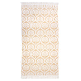 Luxurious Tamarindo Beach Towel in durable Egyptian cotton with velour finish, oversized design, and stylish natural fringing.