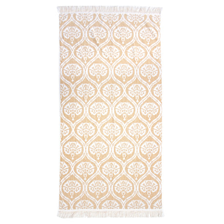 Luxurious Tamarindo Beach Towel in durable Egyptian cotton with velour finish, oversized design, and stylish natural fringing.