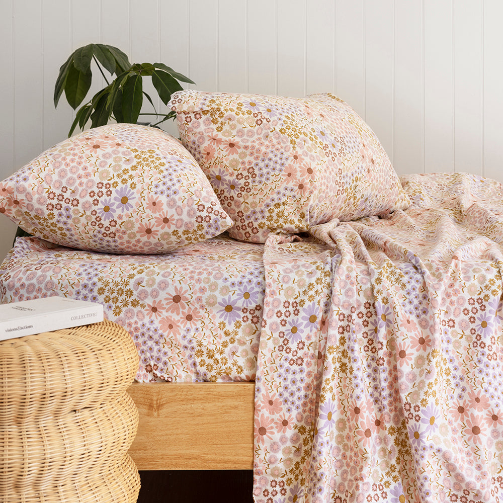 Cozy queen sheet set in brushed premium cotton, featuring a floral design on cream for warmth and style in winter.