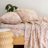 Cozy queen sheet set in brushed premium cotton, featuring a floral design on cream for warmth and style in winter.
